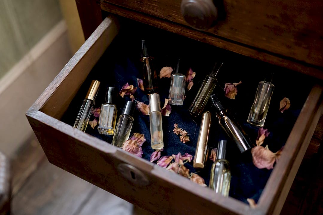 Neatly stored perfume decants in drawer