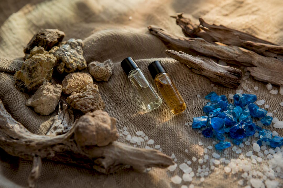 Natural and synthetic ambergris scent elements flat lay