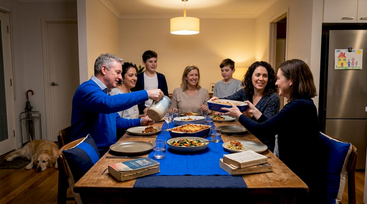 Small group sharing meal and Bible study at home