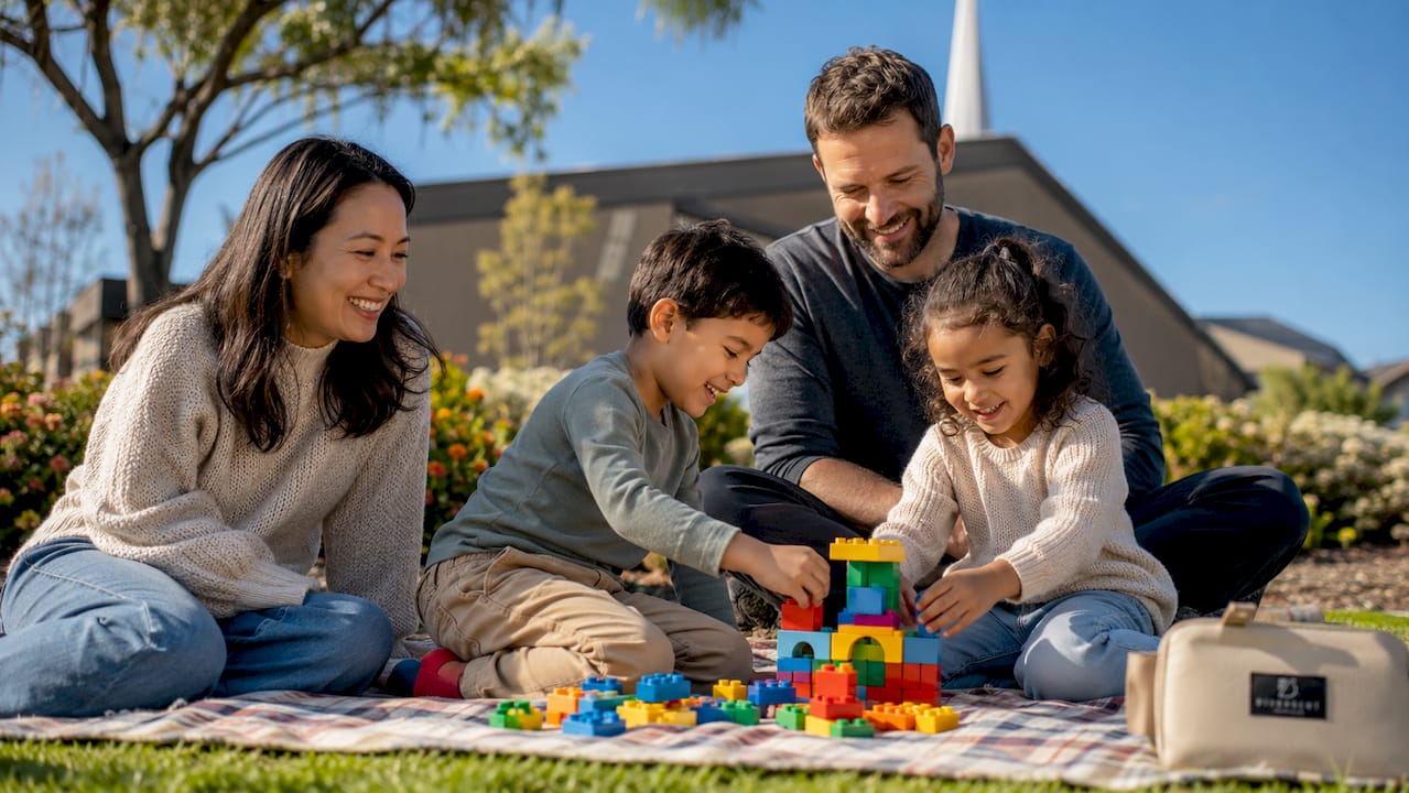 Family engaging in church children’s program