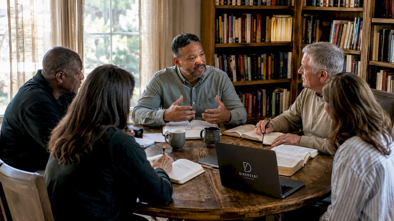 Pastor and elders discussing church leadership roles