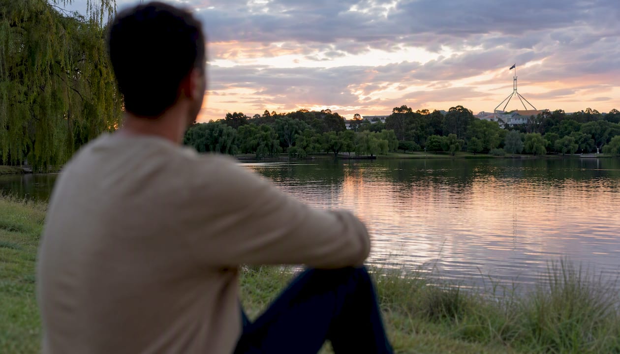 Person reflecting outdoors in Canberra precinct