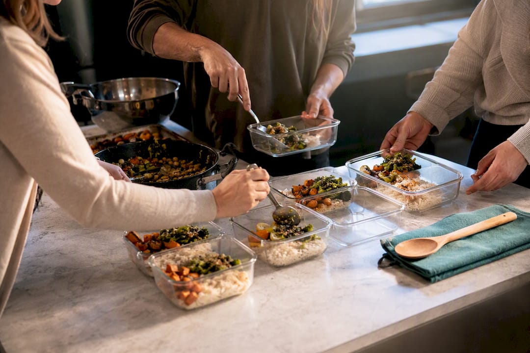 Volunteers preparing meals for community service