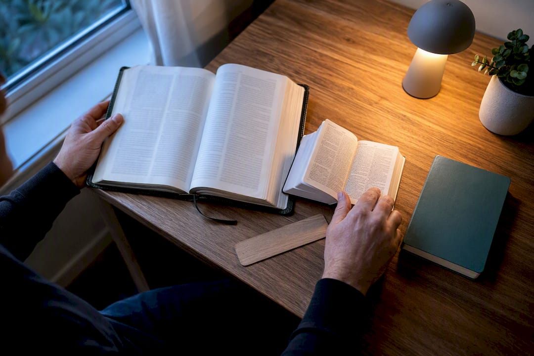 Bible and language tools on study table