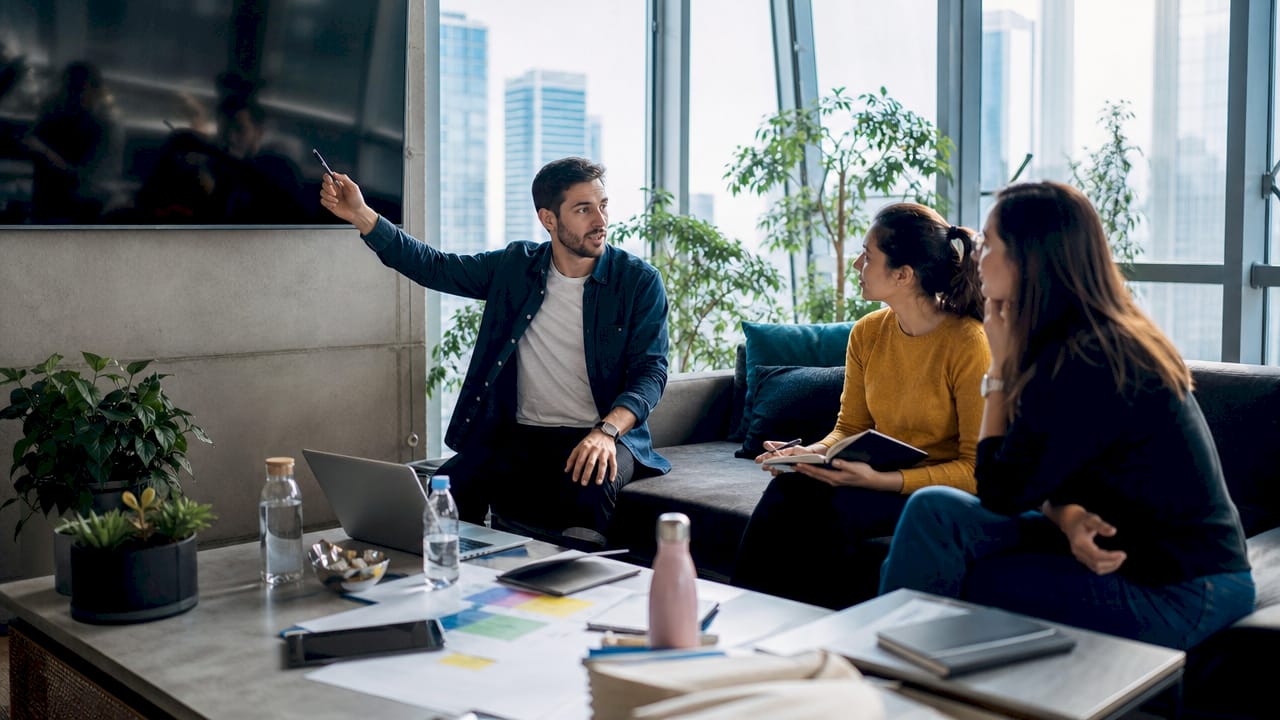IT professionals collaborating on workload migration