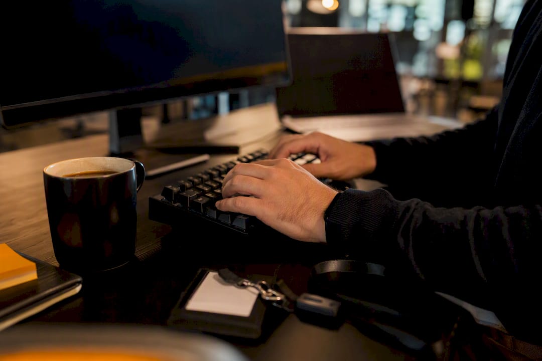 Engineer hands configuring AWS roles in operations center