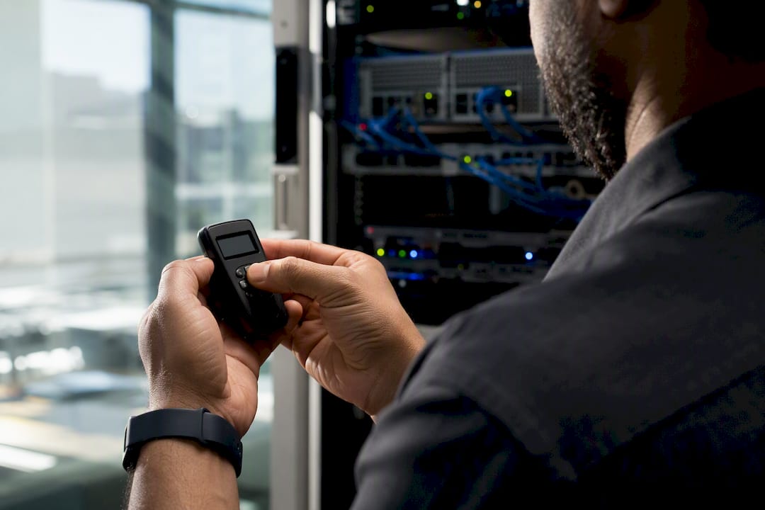 Hands configuring temporary security token device