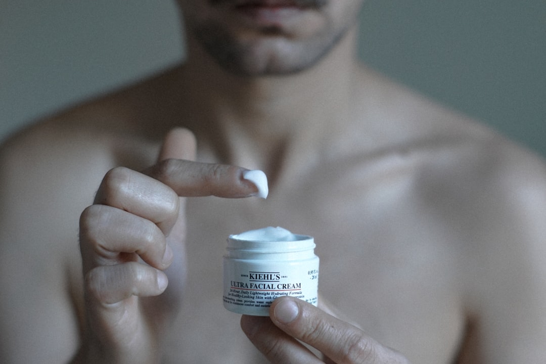 Woman applying serum in morning bathroom routine
