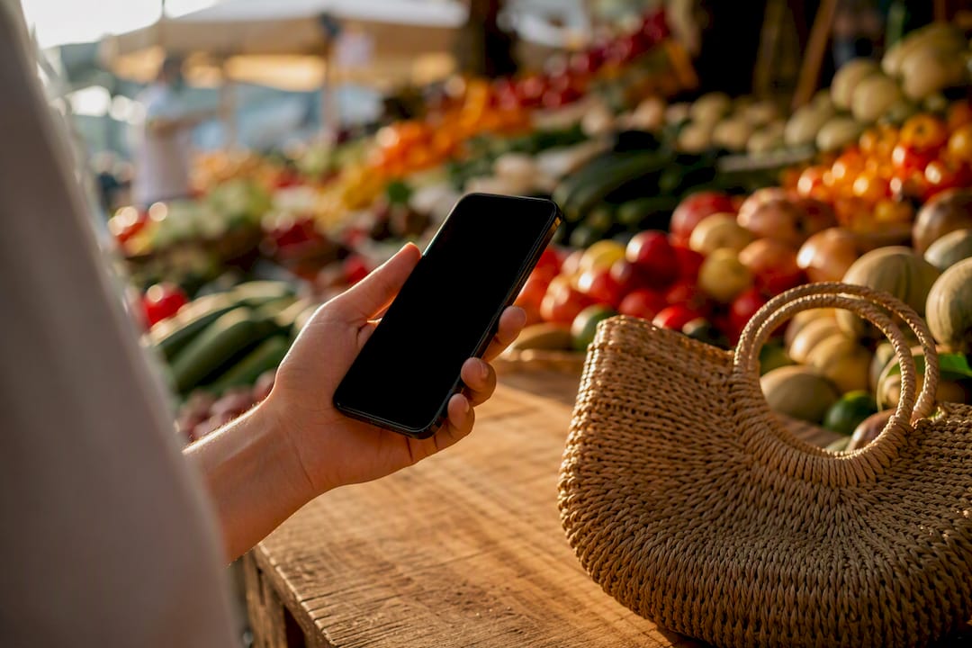 Hand holding smartphone ready to call