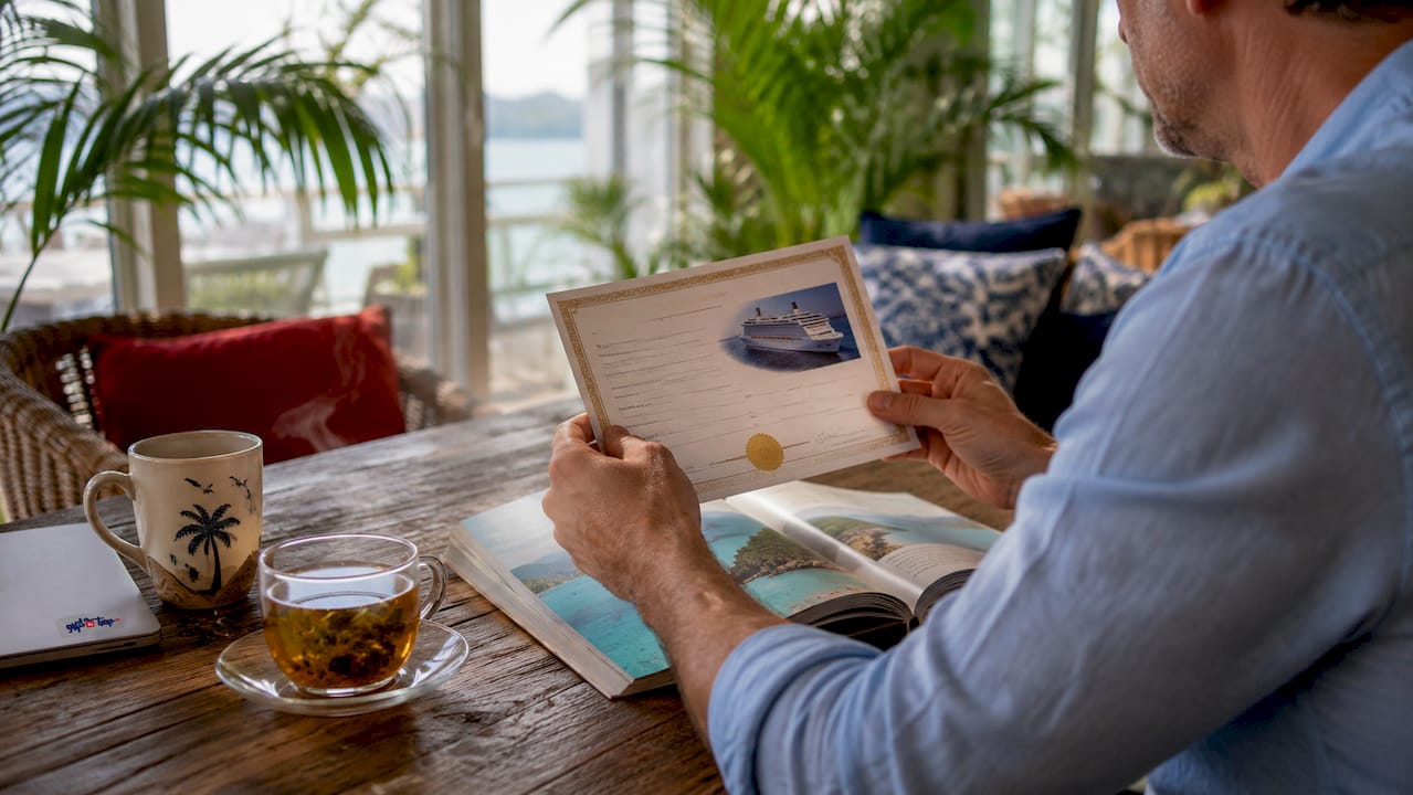 what are cruise certificates? your 2026 complete guide 3 hands holding cruise certificate voucher in meeting room