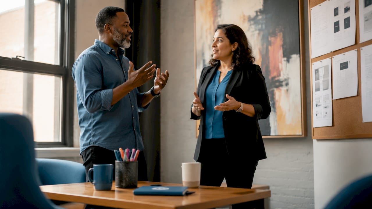 business partners discuss value-based web design
