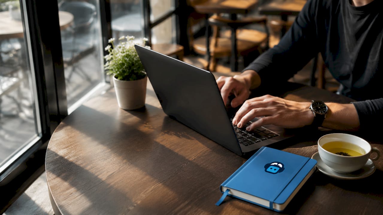 hands typing on laptop in home office for seo