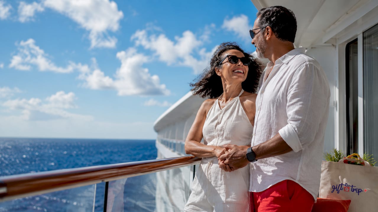 what are branded travel packages? a 2026 guide 4 couple on cruise ship balcony at sunset