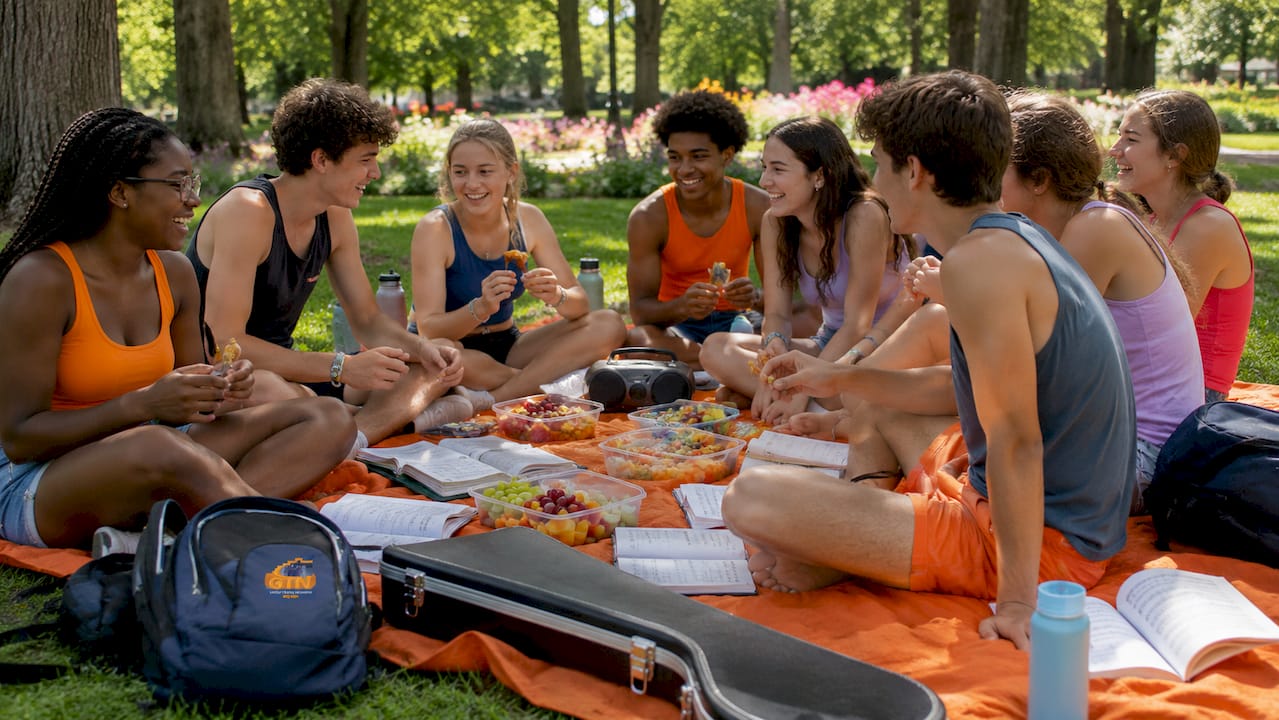 tips for organizing band tours: 10 proven strategies 3 high school students resting together during band tour
