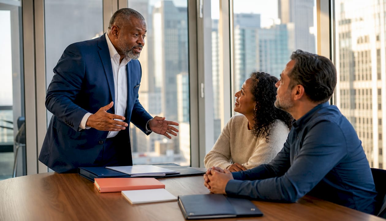 Insurance agent explaining declarations page to clients
