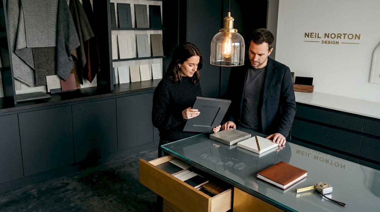 Couple selecting materials in showroom
