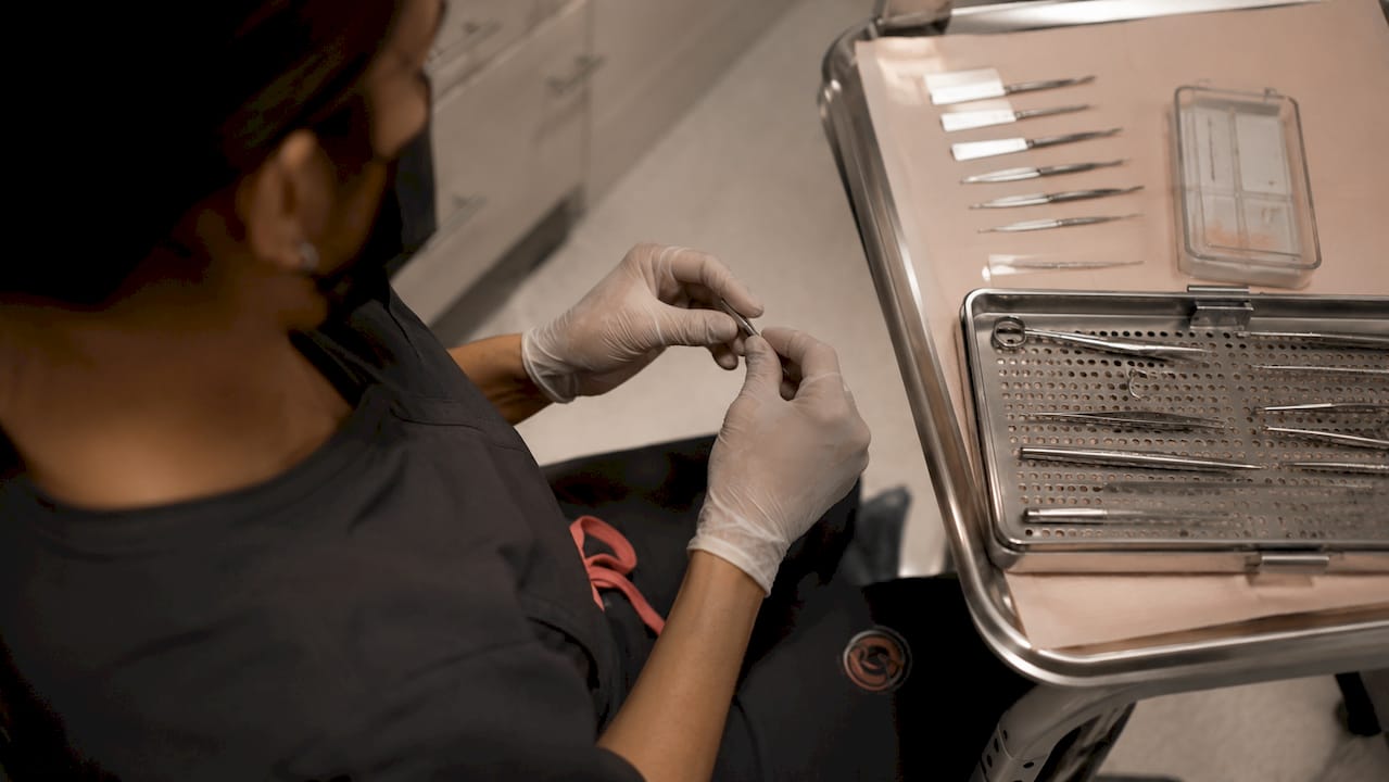 Surgeon performing Mohs micrographic skin surgery