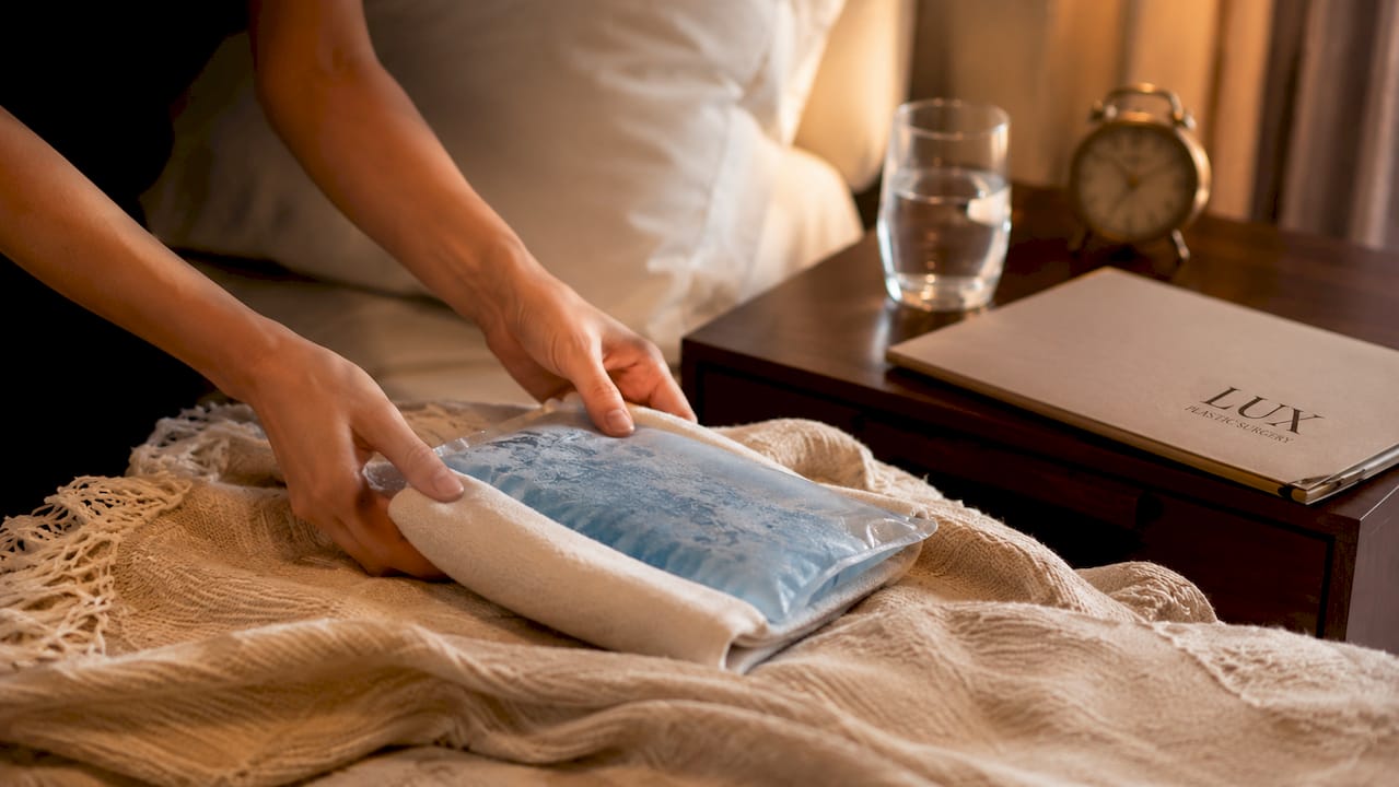 Preparing cold compress for facial surgery recovery