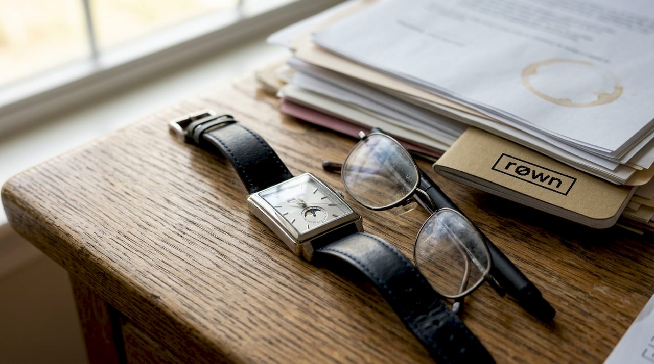 Moonphase watch close-up on wooden desk