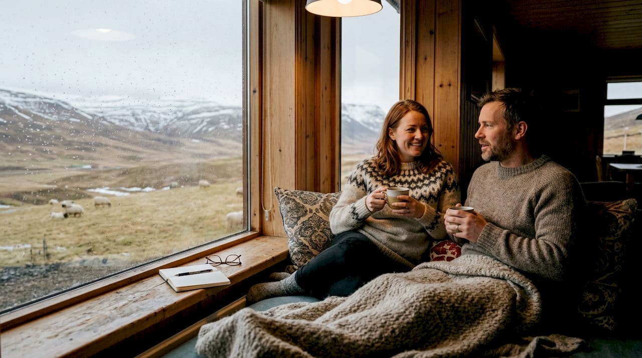 Guests relaxing in cozy Iceland guesthouse