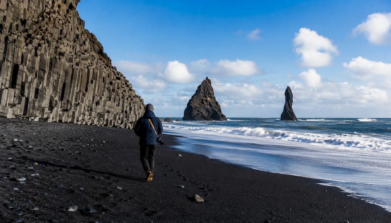 Reynisfjara beach with basalt sea stacks at sunrise