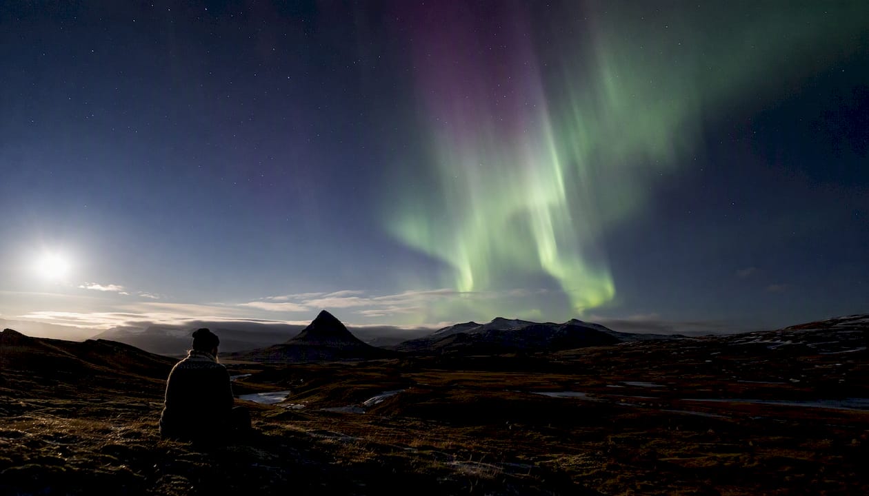 Aurora above Iceland landscape at night