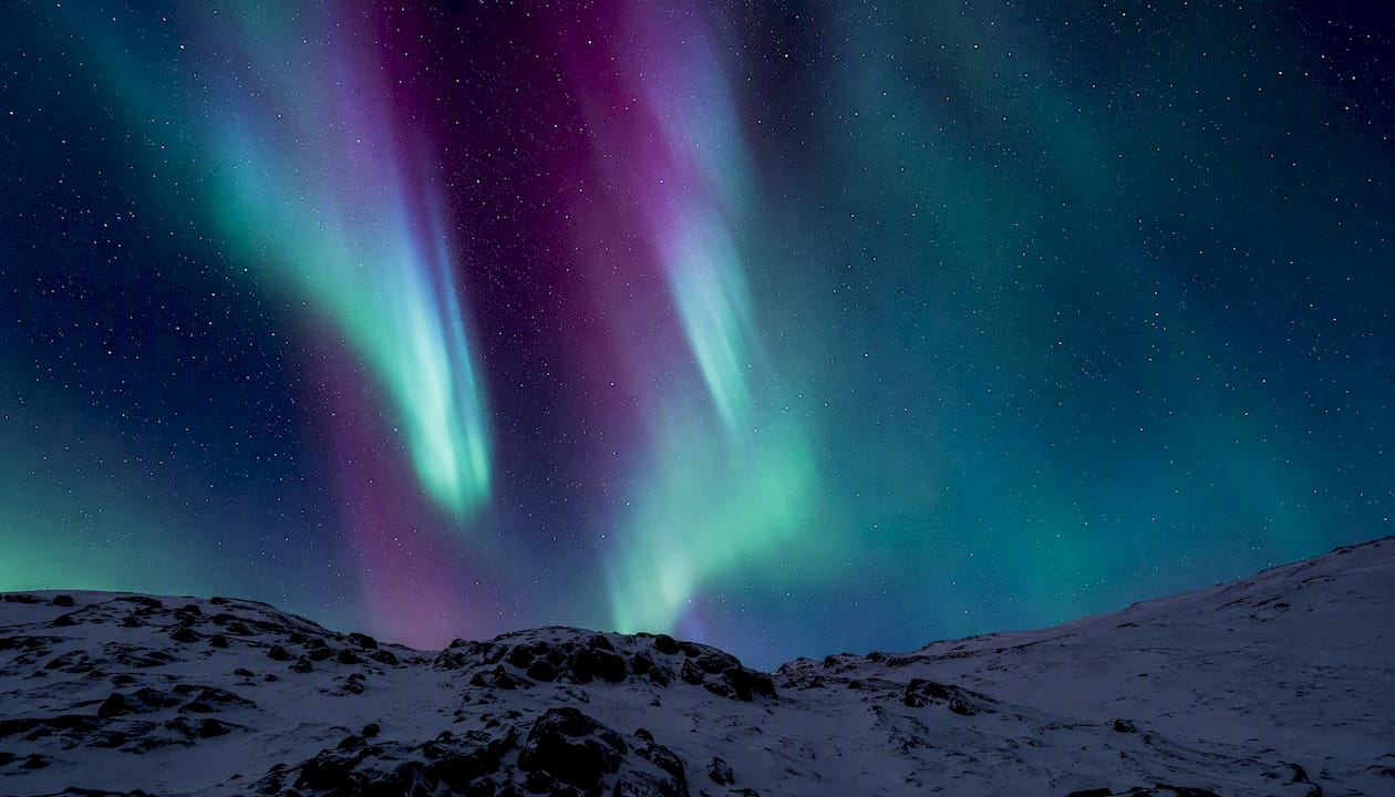 Colorful aurora glow in night sky
