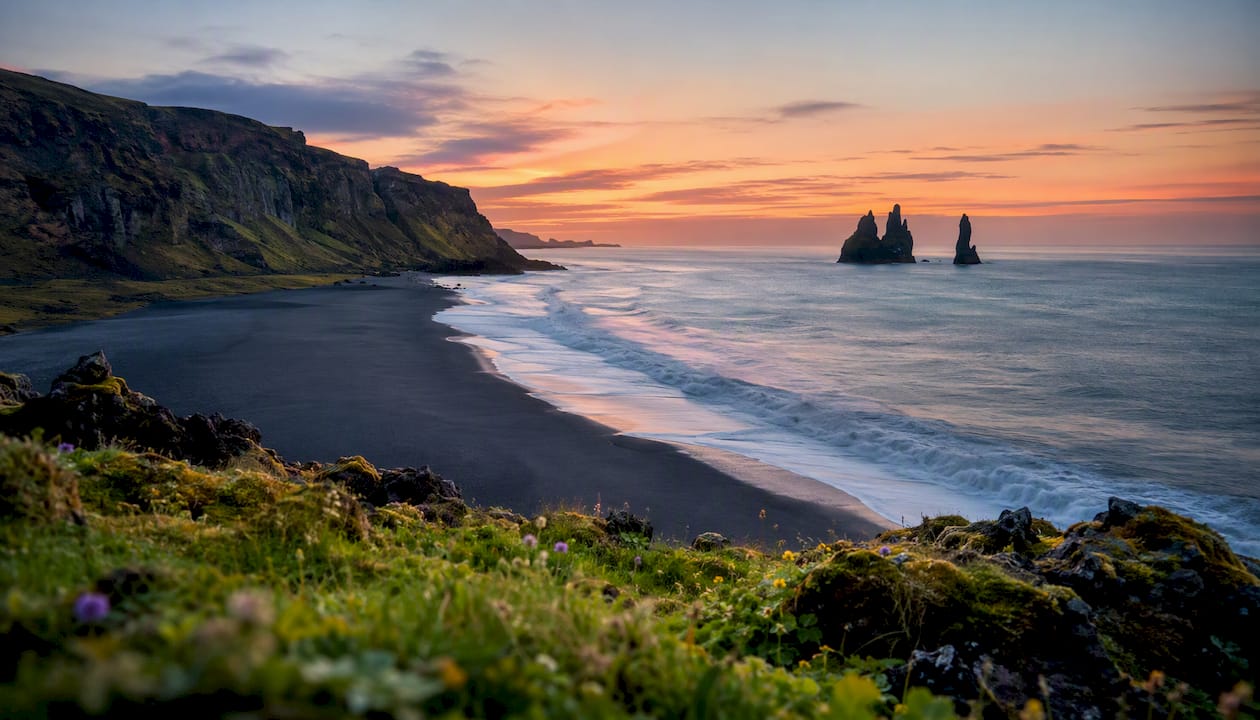 Reynisfjara black sand beach with basalt sea stacks