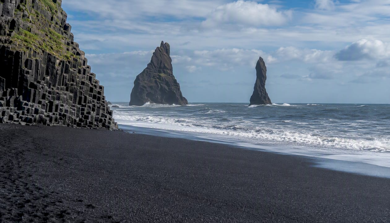 Basalt columns and Reynisdrangar stacks at sunrise