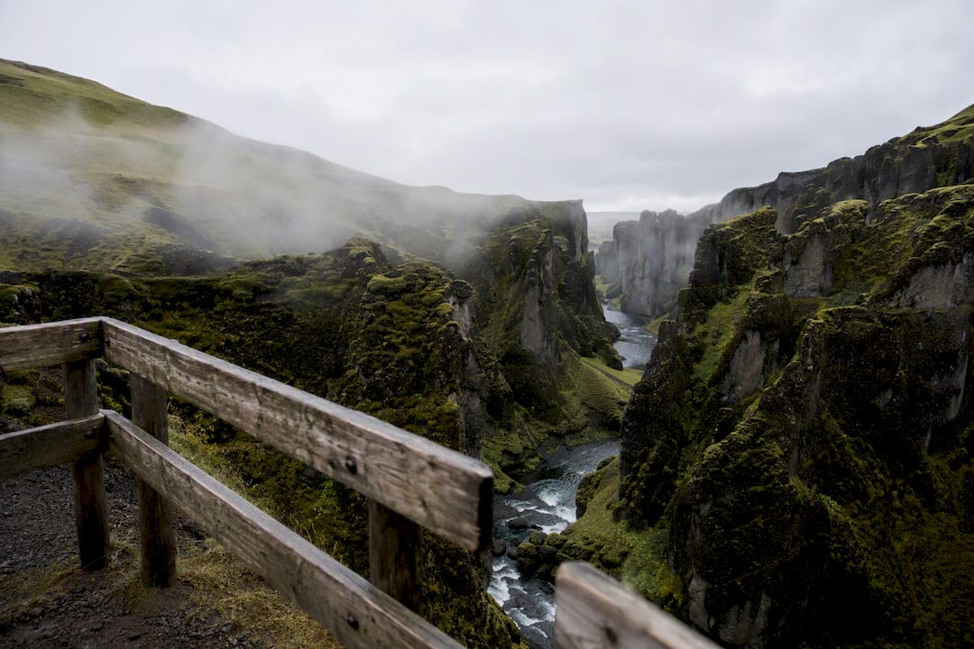 Winding rim trail along Fjaðrárgljúfur Canyon cliff edge