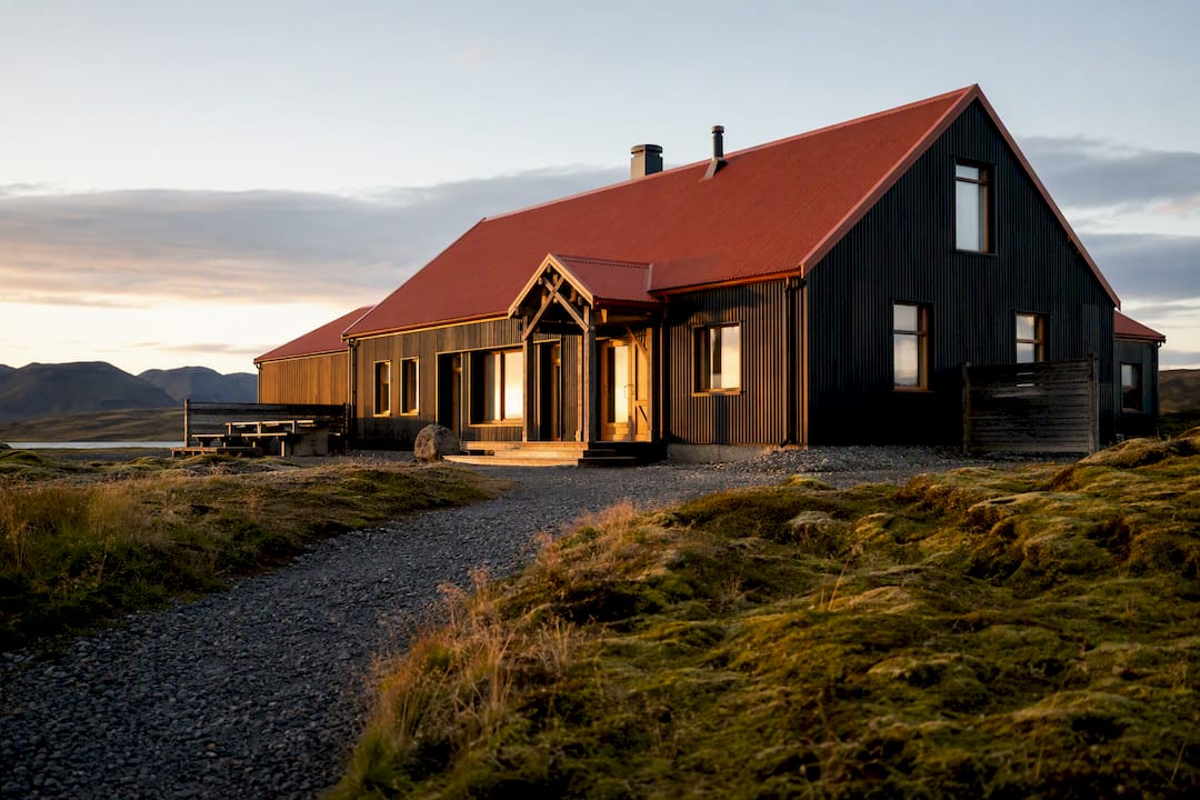 Fox Hostel building exterior at sunrise in Iceland countryside