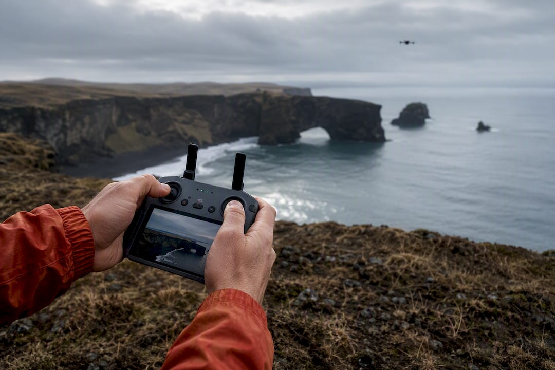 Drone flight above Icelandic coastal cliffs