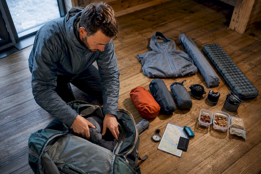 Trekking gear arranged for South Coast packing