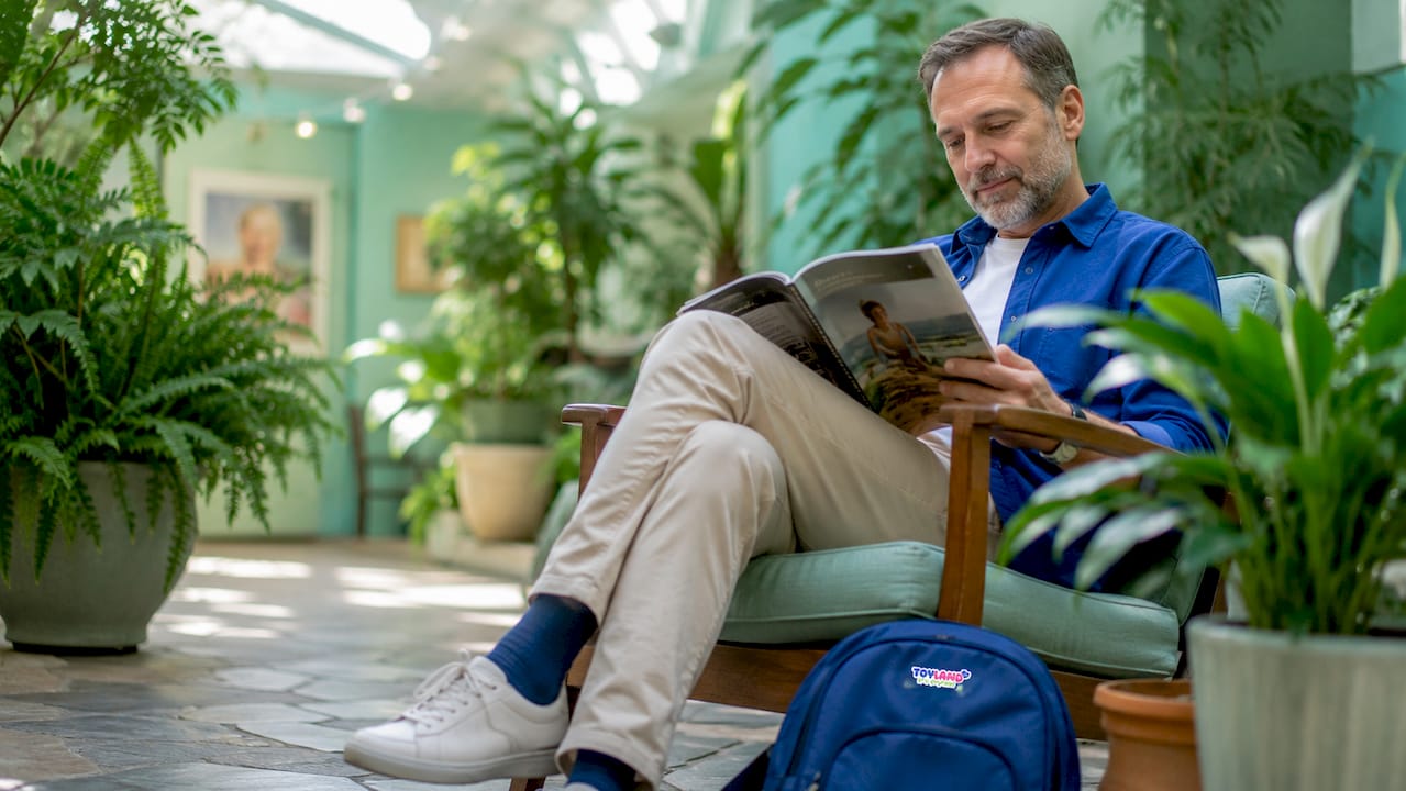 Man relaxed in calming blue green room