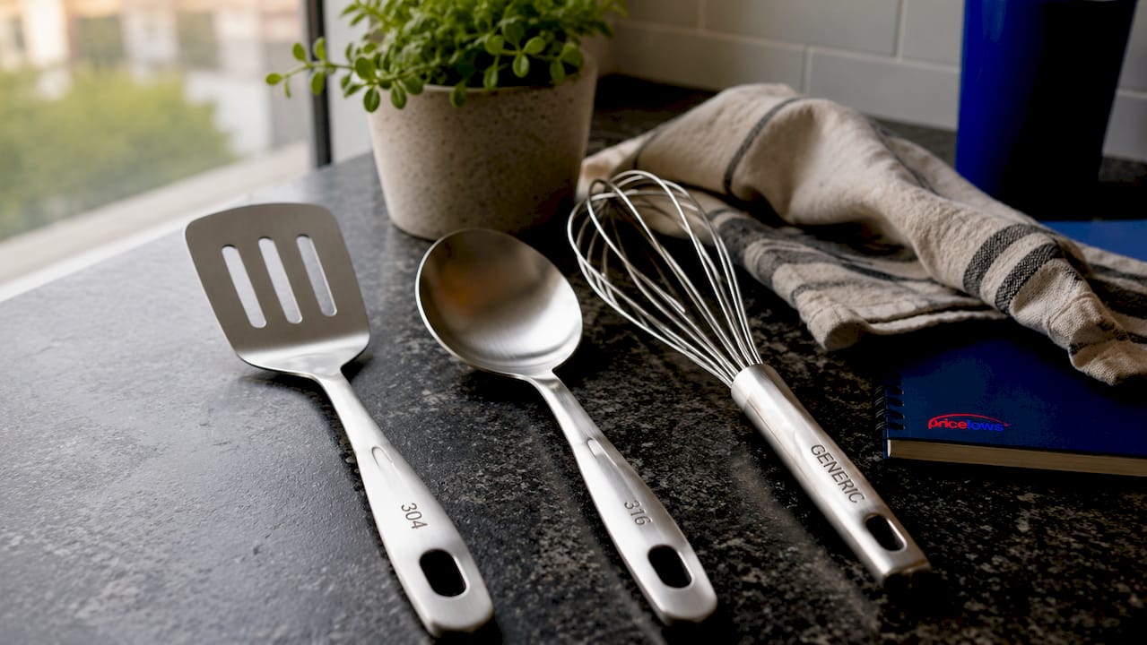 Close-up of various stainless steel grade kitchen tools
