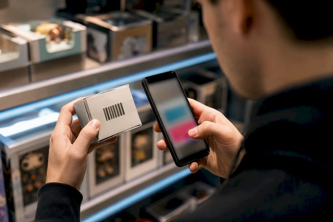 Collector comparing package code with phone