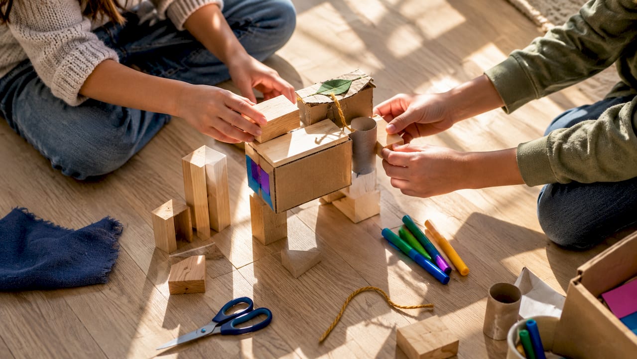 Children building freely with blocks and loose materials