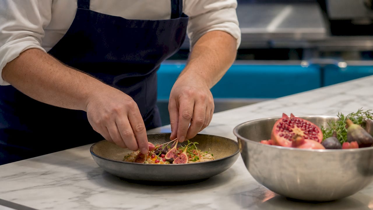 Chef plating autumn seasonal dish