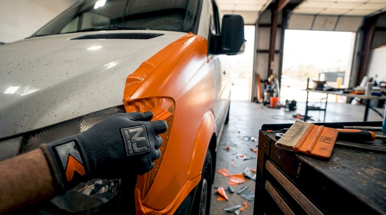 Applying cast vinyl to van fender