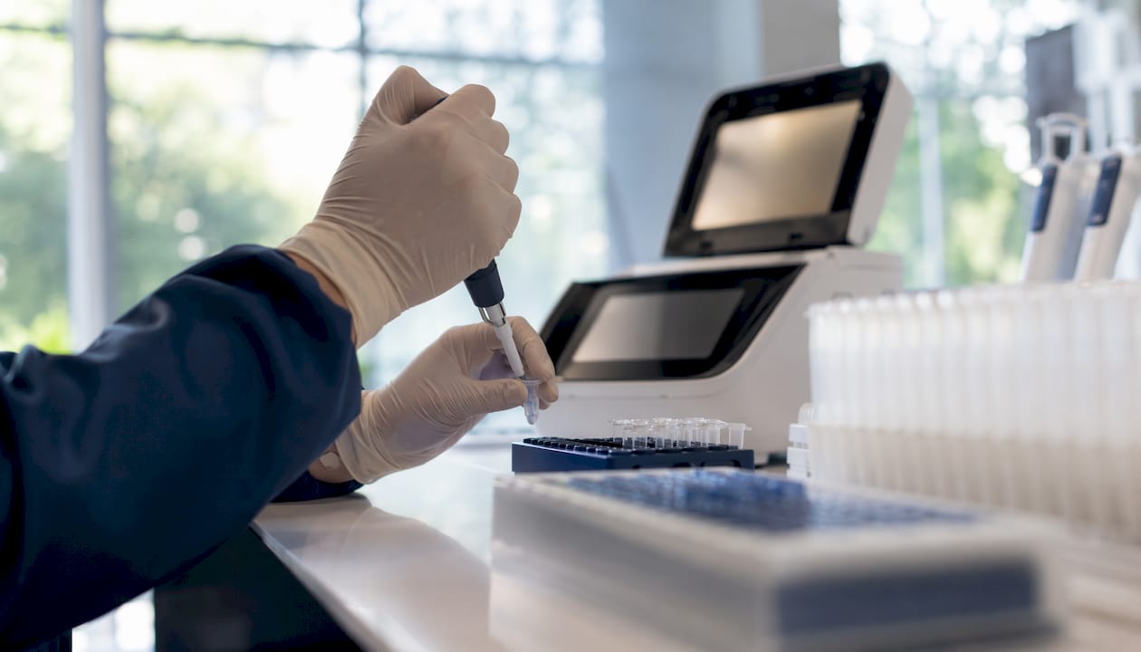 Lab technician preparing PCR test materials