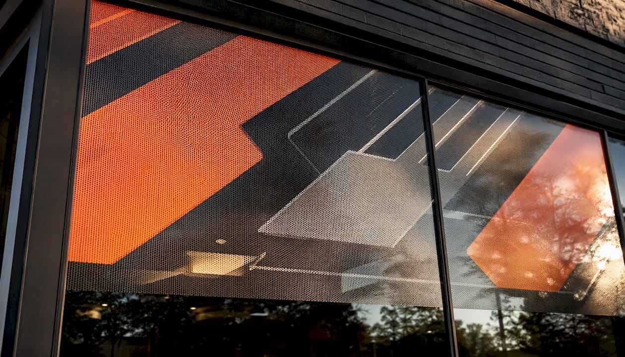 Perforated window film on retail display window