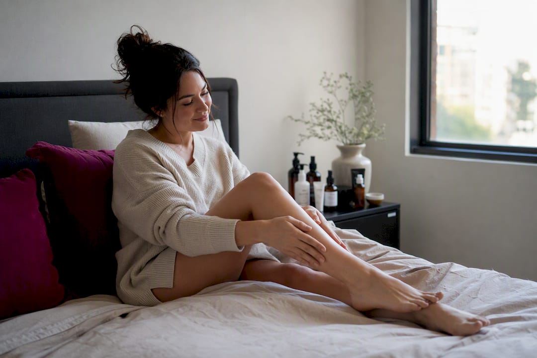 Woman relaxing at home after laser hair removal
