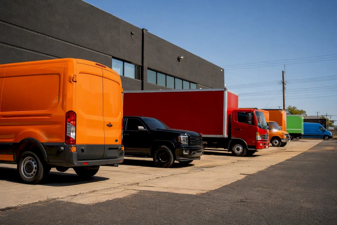 Commercial fleet vehicles in city lot