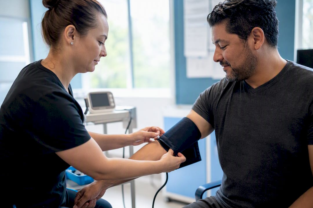 Removing blood pressure cuff after retake
