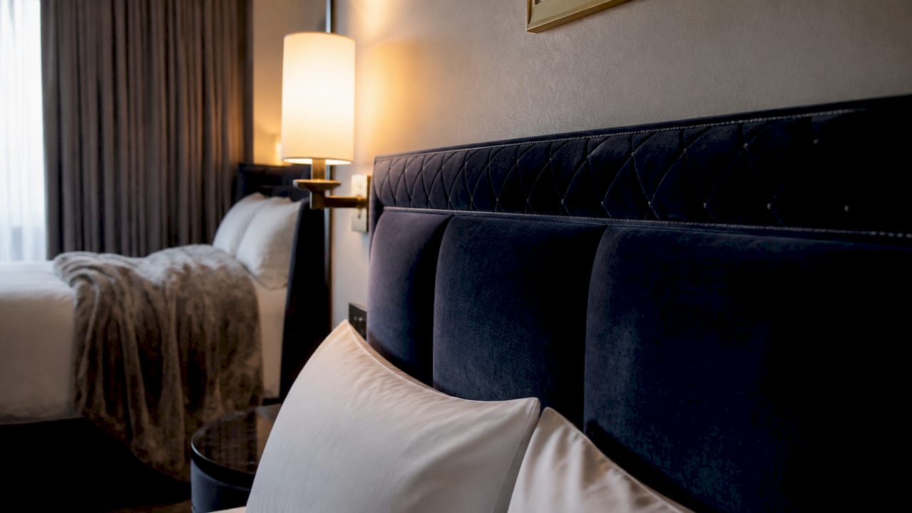 Close-up of velvet headboard upholstery in hotel room
