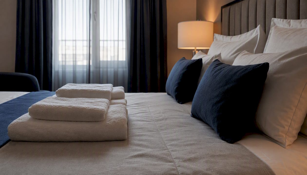 Close-up of hotel bed linens and towels texture