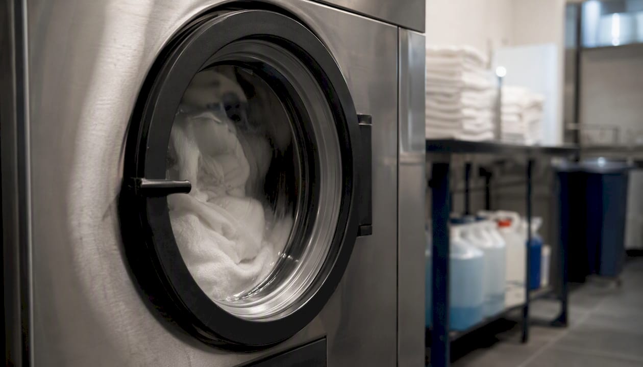 Industrial washing machine tumbling hotel towels