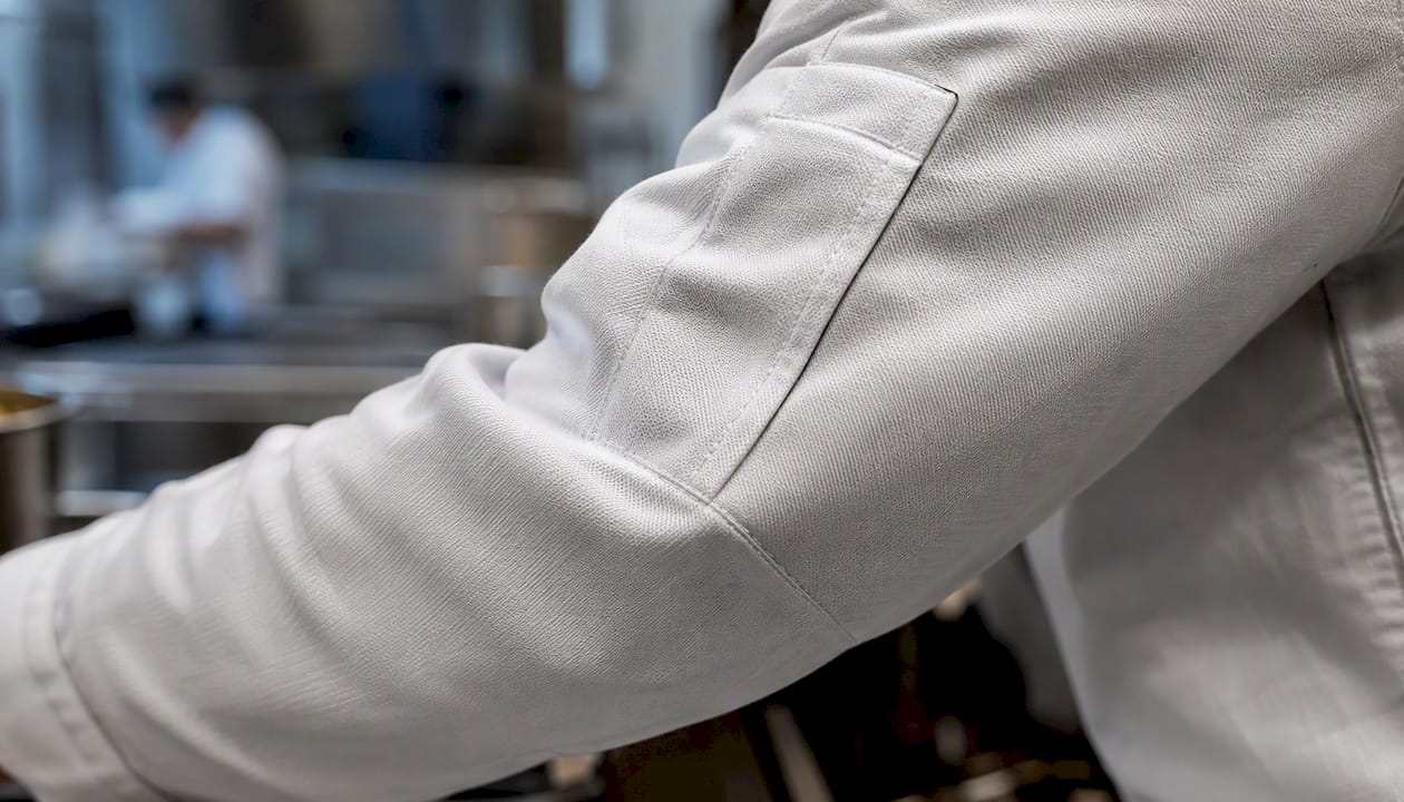 Close-up of FR cotton chef coat fabric sleeve
