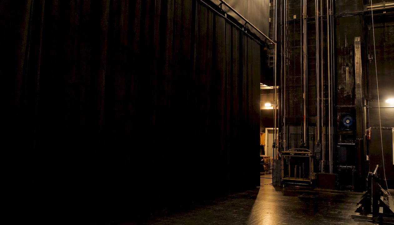 Heavy black masking fabric panel backstage