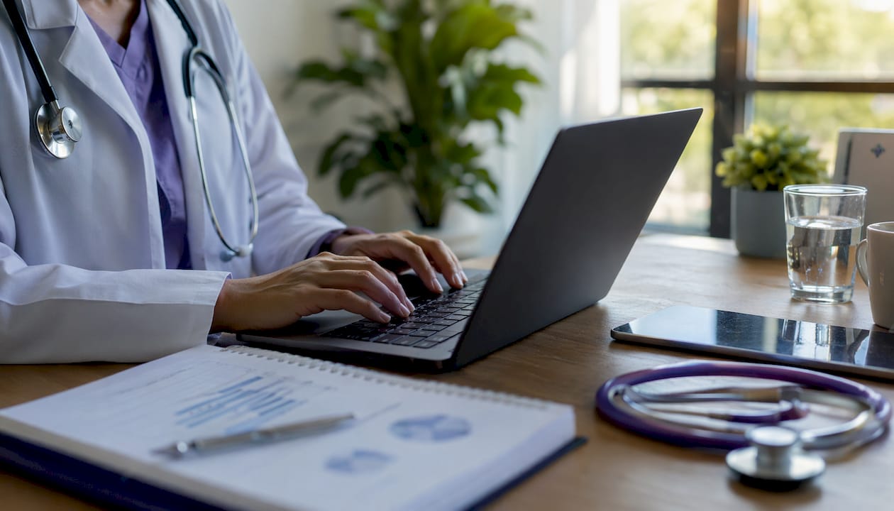 Healthcare professional working on data integration